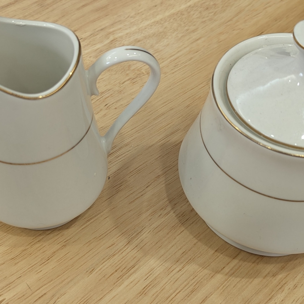 Elegant White and Gold Ceramic Creamer and Sugar Set